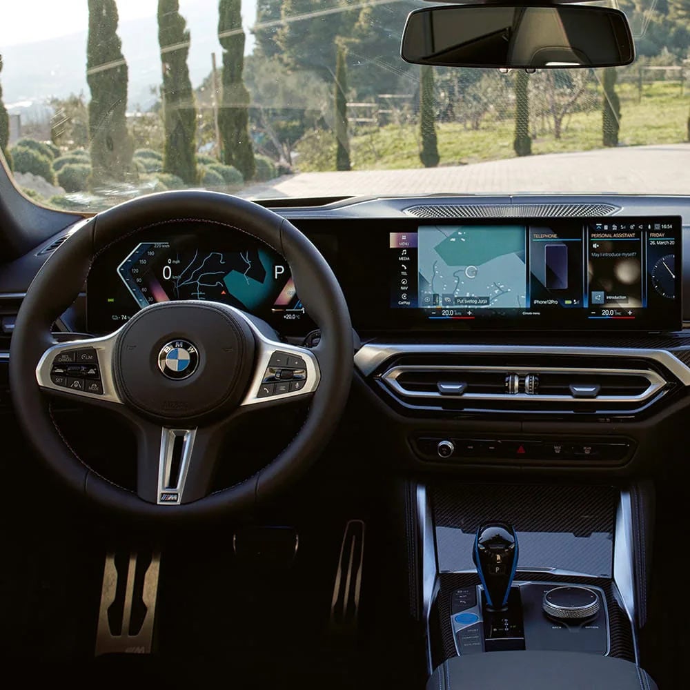 A driver's eye view of steering wheel and controls of the BMW i4 | Valley Auto World BMW in Fayetteville NC